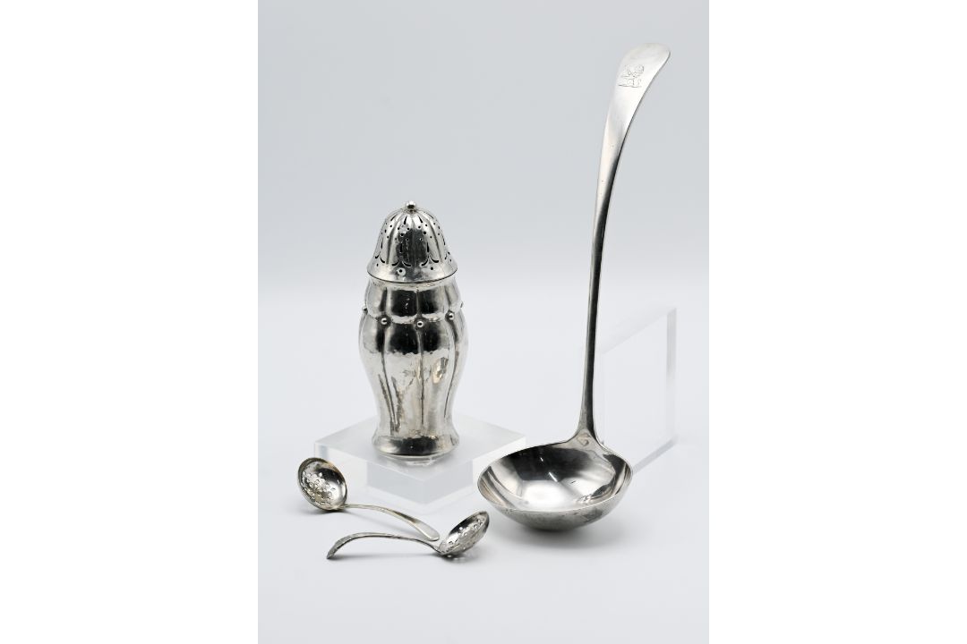 Silver plated ladle together with two caddy spoons and an Arts & Crafts style Norwegian sugar caster