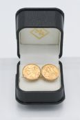A pair of 9ct gold half sovereign cufflinks dated 1911 & 1914, total weight 14g, with original