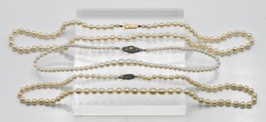 Three Cultured pearl necklaces to include single row with silver clasp, approx. length: 16cm, single
