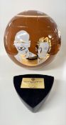 A Manchester United fine porcelain 'The 100 Years at the Top' trophy, with plaque stand, boxed.