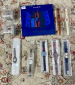 A collection of 24 Swatch watches (list available).