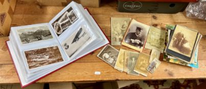 A small collection of postcards to include black and white portrait postcards, military and modern
