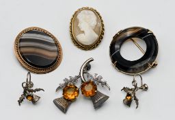 A 9ct gold cameo brooch, two other 9ct gold brooches total weight of 9ct gold brooches 22.8g, and