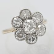 A diamond cluster ring set in yellow gold indistinctly hallmarked, size M