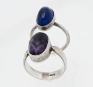 Silver ring set with a hardstone possibly Blue John together and one other ring (2)