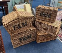 A collection of Fortnum & Masons wicker hampers together with some long baskets etc (6 hampers, 3