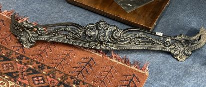 A small antique fire grate, width approx. 106cm