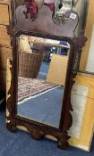 A Geo III mahogany framed Mirror, measuring 95 x 54cm