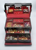 A mixed collection of costume jewellery and gold jewellery to include a 9ct gold leaf brooch, 9ct