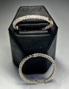 A pair of 14ct yellow gold diamond hoop earrings, approx. 3.00ct of diamond, approx. 10g.