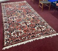 A Persian Bakhtiari woollen rug measuring 315 x 165 cm