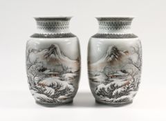 A pair of ‘famille-rose’ winter landscape mirror vases in the style of He Xuren (1882-1940) Each
