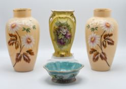 A lobed ‘famille-rose’ footed dish, painted with fruit and butterflies, 15.5cm; together with a pair