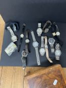 A collection of various general gents and others wristwatches including Sekonda in walnut box