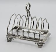 A Victorian London silver six division toast rack, makers mark JCE, approx. 9.56oz