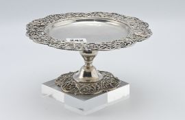 A George V London silver comport with pierced ornate border and foot decoration, 15.30oz, height 9.