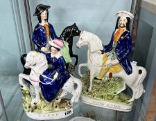 A pair of 19th century Staffordshire figures Tom King and Dick Turpin also another titled Queen (3)