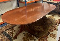 A good quality reproduction George III style pedestal table with two extensions leaf's, maximum