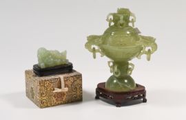 A carved serpentine censer and cover, the rounded bowl carved with a pair of dragon and loop handles