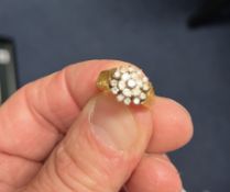 An 18ct bark effect and diamond cluster ring, size J, approx. 4g