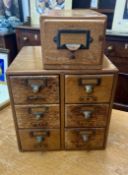 A bank of six drawers and another single drawer