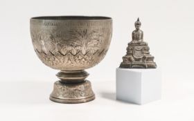 A Thai silver matched repoussé bowl and stand, 19th/20th century, the bowl with deep rounded sides