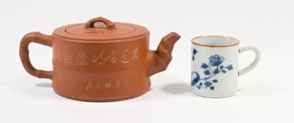 A Yixing teapot and cover, 20th century In the form of a section of bamboo trunk with a bamboo