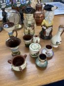 Small collection of pottery including Honiton candlestick, two Ralph Wood replica toby jugs
