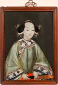 A reverse glass painting of a lady, 19th century, three quarter length (framed) 55 by 40.3cm