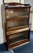 A mahogany three section Globe Wernicke type bookcase, width approx. 88cm