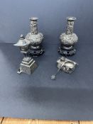 A pair of Chinese silver vases embossed with flower decoration, height 9cm, marked HC, approx. 3.