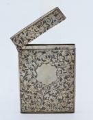 A Mappin & Webb silver card case with ornate scroll decoration in original fitted box, case size 9.
