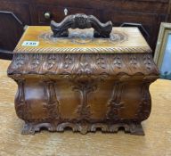 A 20th century Black Forest carved and fitted jewellery box, height 27cm width 30cm