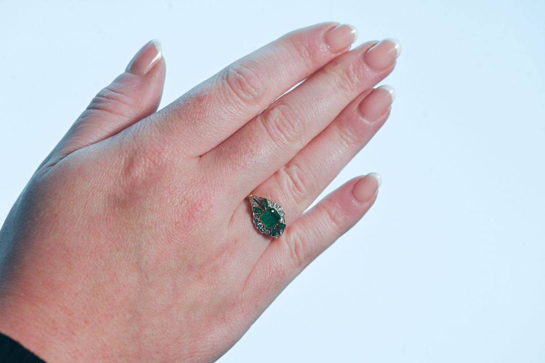 An emerald and diamond ring set in 18ct yellow gold with centre emerald (6mm x 5.5mm) with cut - Image 2 of 3