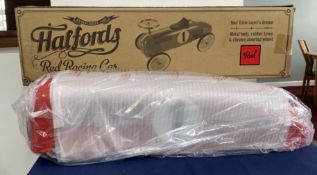 Halfords red racing car - Ride on toy. ‘Your little racer’s dream’. Metal body, rubber tyres &