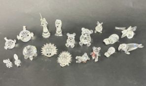 Swarovski Crystal Glass, a collection of various animals, including four teddy bears, a walrus (