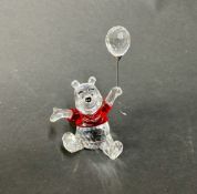 Swarovski Crystal Glass, 'Pooh' with balloon and red jumper, boxed.