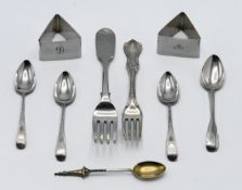 A pair of triangular napkin rings, together with flatware including Victorian forks, teaspoons