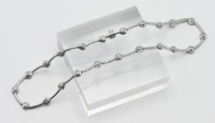 Bernstones- a 14k white gold and diamond set necklace, boxed, approx. 27.9g.