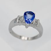 Am 18k white gold diamond and tanzanite ring, size O.