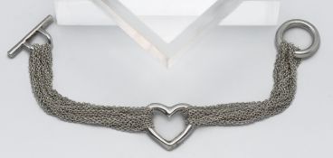 Tiffany & Co silver heart bracelet, with box and pouch.