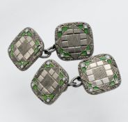 A pair of white metal and green and white enamel fancy cufflinks.