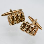 A pair of 9ct gold gents cufflinks, total weight 4.28g.