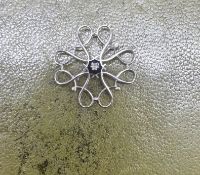 A 9ct white gold and diamond brooch, approx weight 3g.