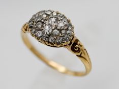 A good Edwardian diamond set cluster ring (hallmark rubbed), size O.
