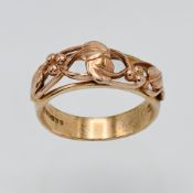 A 9ct rose gold Clogau leaf style band ring, approx 4.62g, finger size R.