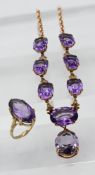 A 9ct gold and Amethyst set to include ring and necklace, ring size O/P, total weight 33.58g.