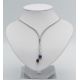 A stunning diamond line necklace set in 18ct white gold, further set with a large single ruby and - Image 1 of 2