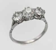 A fine platinum ring set with three old cut diamonds, finger size V, (not hallmarked).