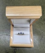 An 18ct yellow gold diamond and sapphire ring, size J.